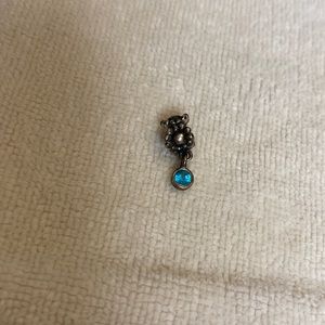 Pandora charm with hanging blue stone